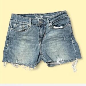Blue denim distressed shorts